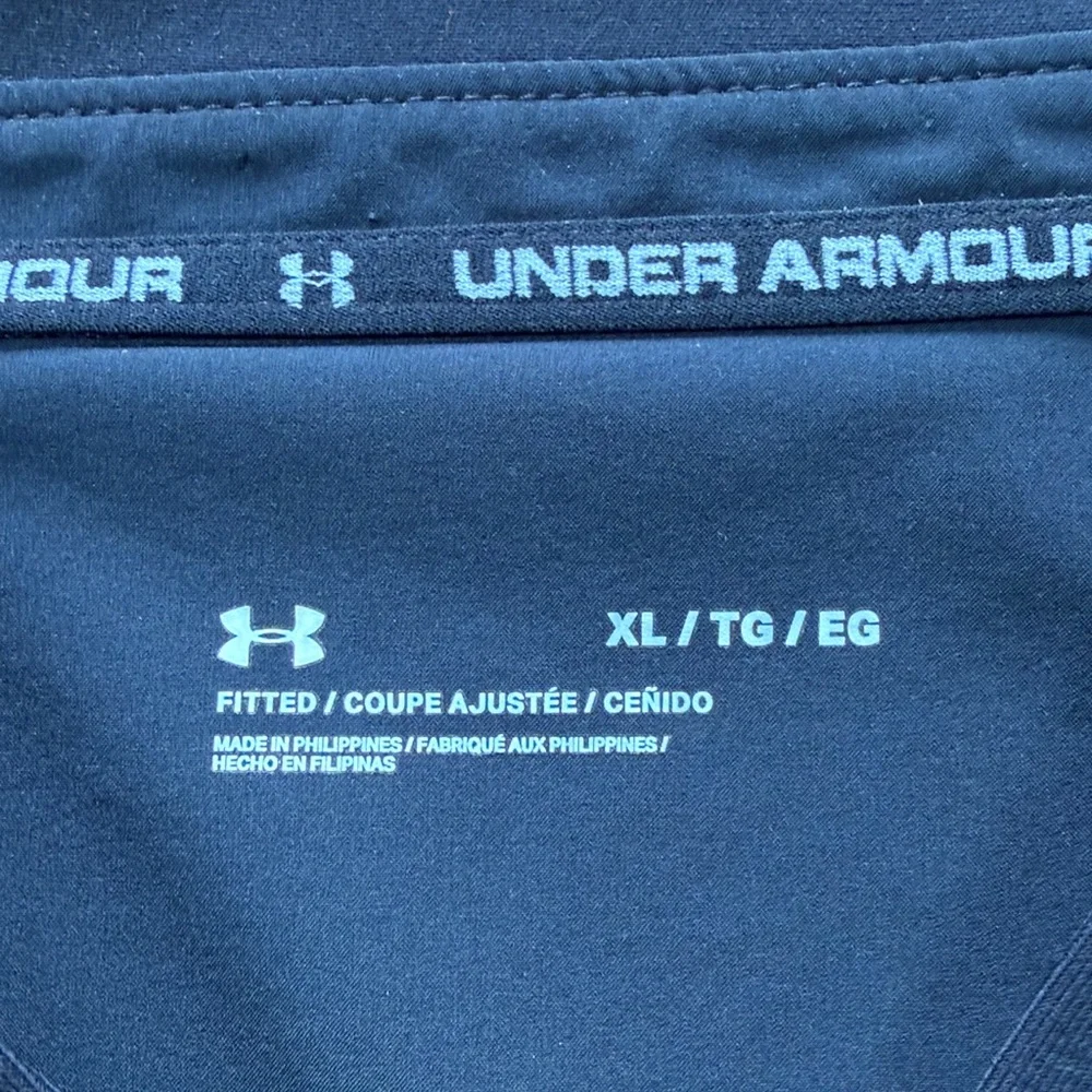 Under Armour black men’s zip front vest.  Front pockets. Size XL fitted. - Picture 2 of 9